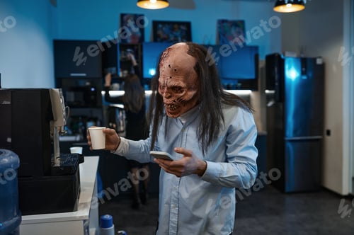 Preview: Zombie worker making coffee and speaking mobile phone