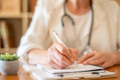 Preview: Healthcare professional wearing a white coat and stethoscope writing observations