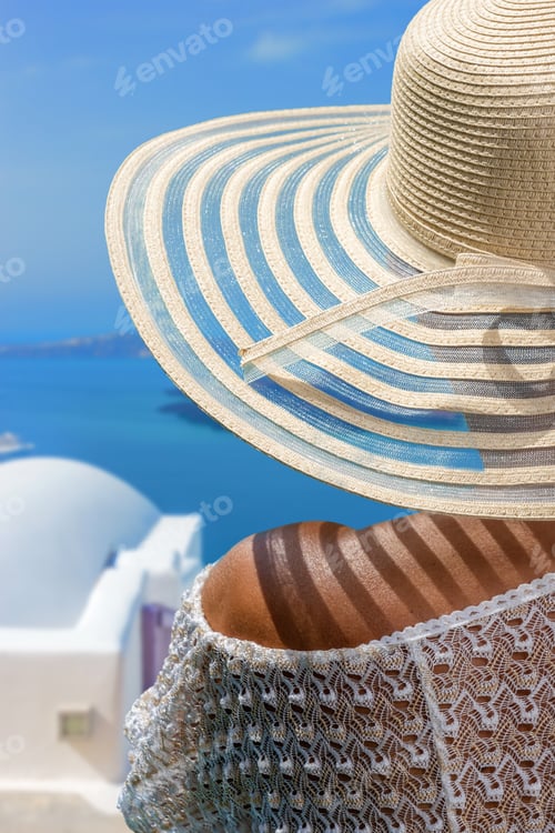 Preview: Woman on holidays in Santorini Greece