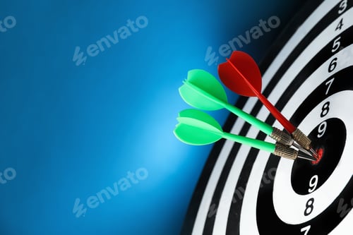 Preview: Arrows hitting target on dart board against blue background