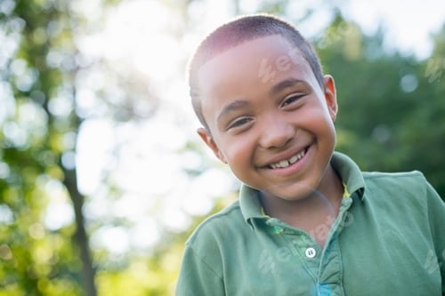 Preview: A young boy outdoors on a summer day.