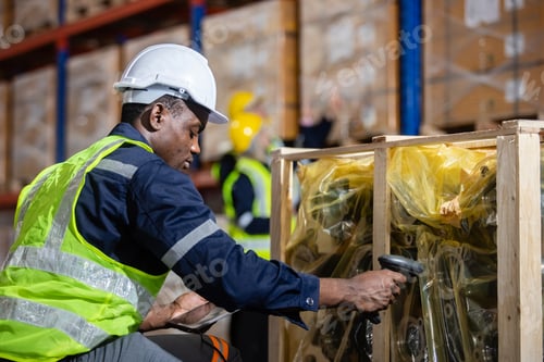 Preview: Male worker is pointing finger inspecting product in factory.