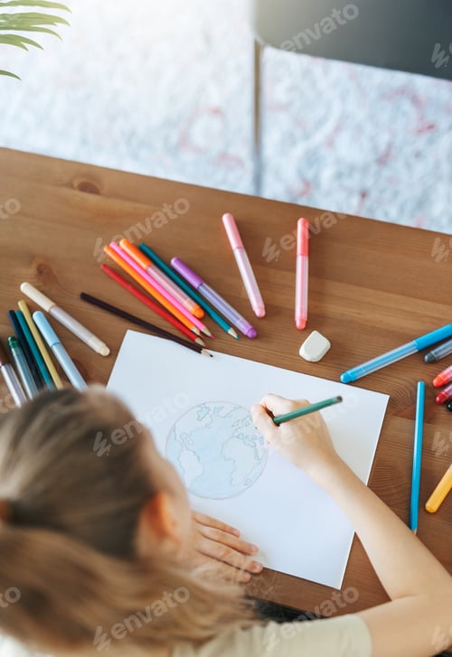 Preview: Child girl drawing with colorful pencils