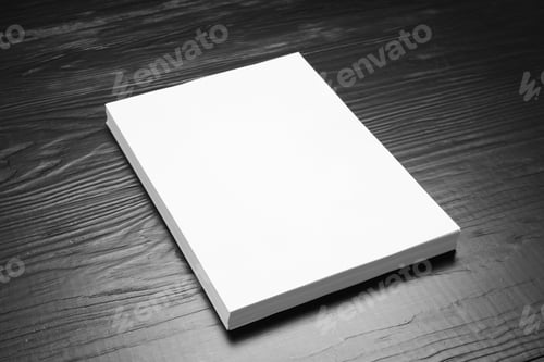 Preview: Stack of blank paper sheets for brochure on black wooden background. Mock up