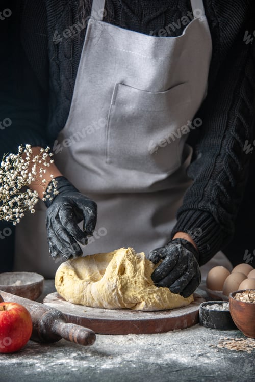 Preview: front view female cook rolling out dough on dark background egg cuisine job pastry bakery kitchen