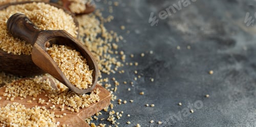 Bulgur Wheat Grains in Wooden Bowl and Scoop