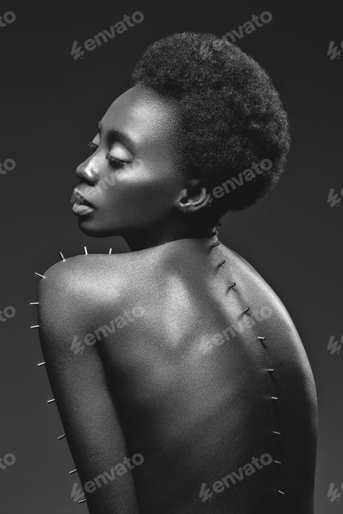 Preview: Beautiful black girl with metal pins
