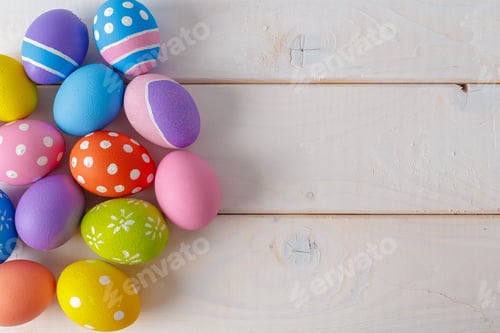 Preview: Colorful eggs arranged on a wooden surface for a spring celebration activity
