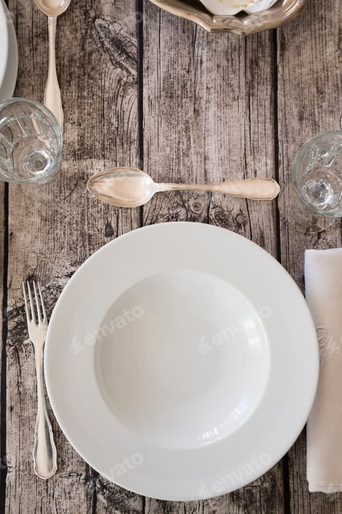 Preview: Place cover on laid table, elevated view