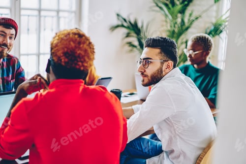 Preview: Group of young students brainstorming while preparing to education exams