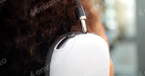 Preview: Portrait of smiling happy woman walking in street with backpack