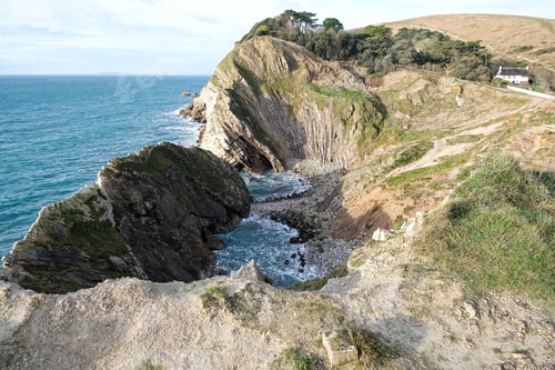 Preview: Lulworth Cove cliffs view on a way to Durdle Door. The Jurassic Coast is a World Heritage Site on th