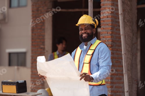 Preview: Portrait of engineers work together to assess the residential home construction site's progress