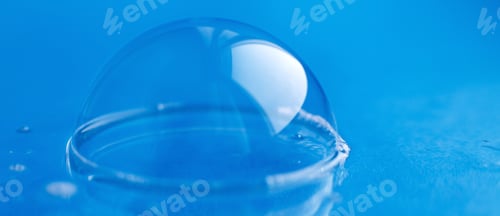 Preview: soap bubble close up. abstract blue water background
