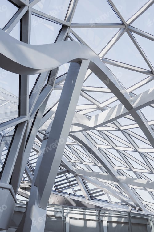 Preview: Vertical shot of the interior of a white geometrical building