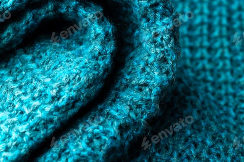 Preview: Micro close up of blue crocheted woolly fabric with copy space