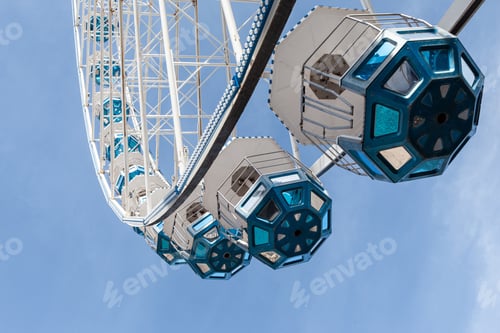 Preview: The pods of the Ferris wheel fly in the sky