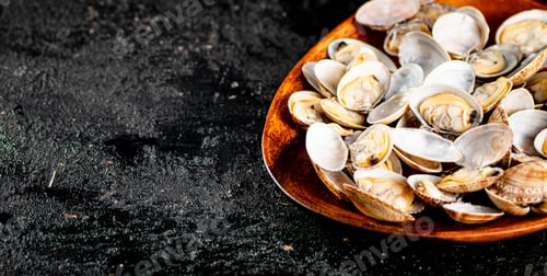 Preview: Vongole in a plate on the table.