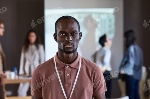 Preview: Professional Man Poses in Workplace Meeting Room