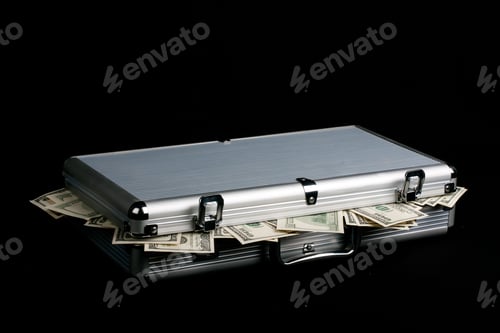 Preview: Silver case full of cash dollars on black background