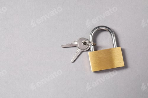 Preview: Steel padlock with keys on grey background, top view. Space for text