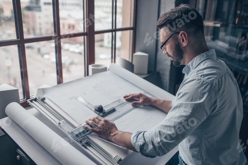 Preview: Mature man with glasses at work