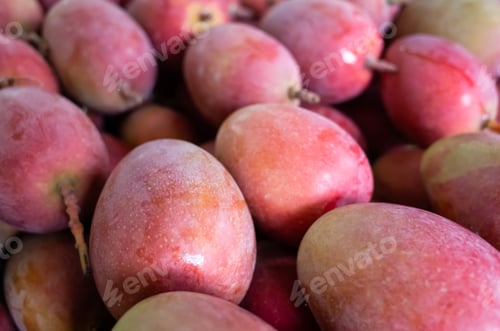 Preview: Stacks Of Mango Fruits In Vivid Red Color At Traditional Marketplace, Taiwan