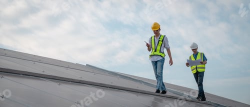 Preview: Service engineer checking solar cell on the roof for maintenance if there is a damaged part.