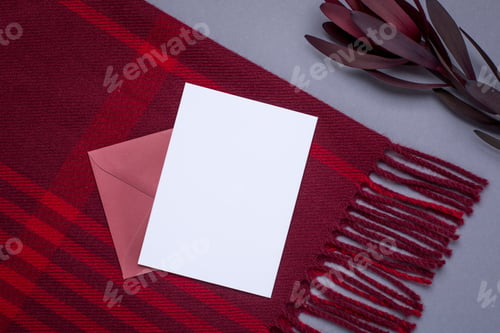 Preview: Gift card and burgundy wrap on a gray background