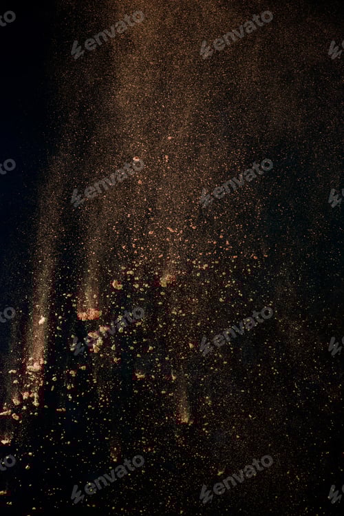 Preview: Cocoa powder explosion in motion. Chocolate dust on a black background. Action food photography.