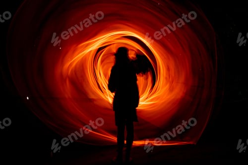 Preview: Long exposure shot of light trails against a dark background
