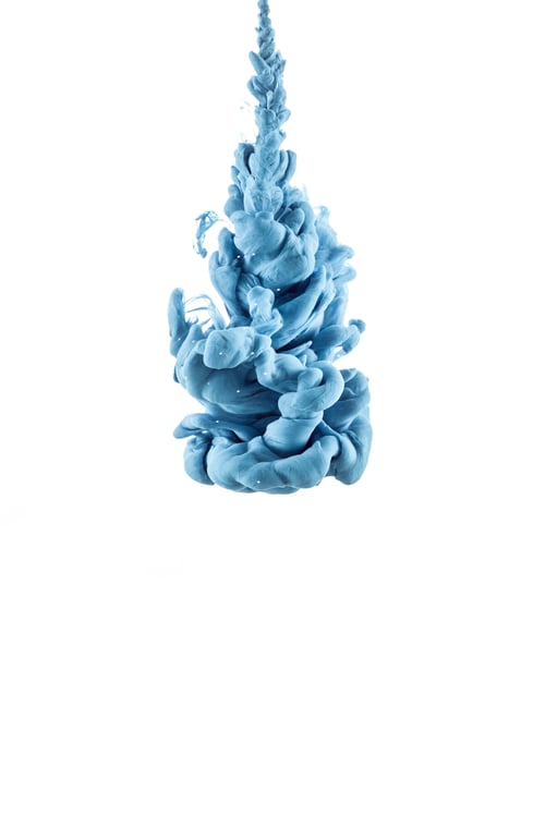 Preview: close up view of blue paint splash in water, isolated on white with copy space