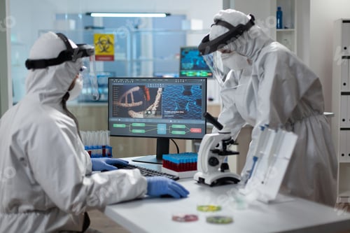 Preview: Researcher team analyzing coronavirus medical expertise during covid19 vaccine development