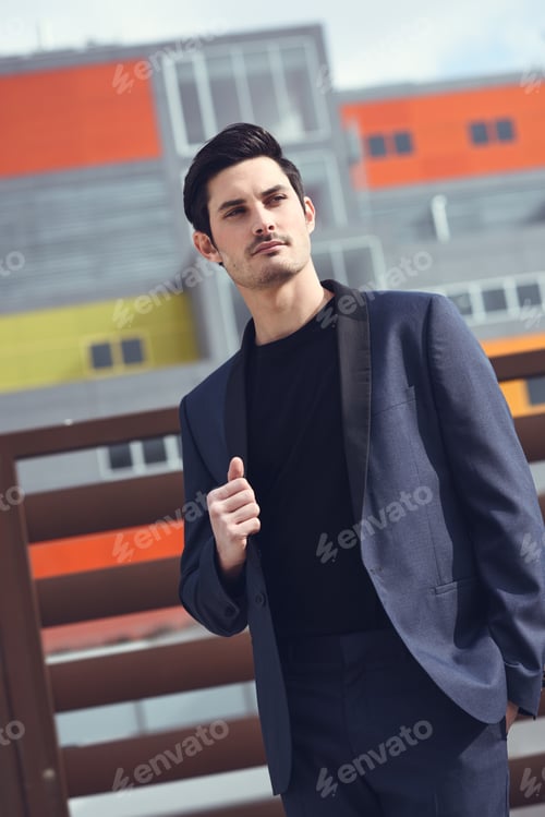Preview: Handsome man, model of fashion, wearing modern suit.