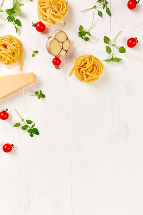 Preview: Pasta, Cheese, Garlic and Tomato Preparation on White