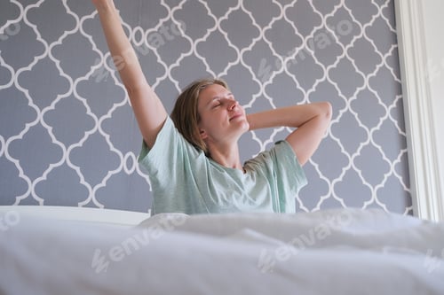 Preview: Woman Stretching in Bed, Morning Wake Up