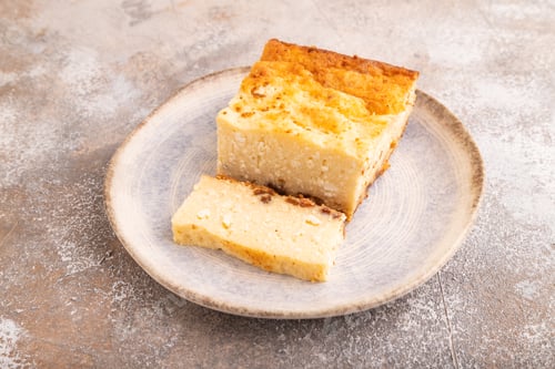 Preview: Сottage cheese Сasserole, Curd cake, with dried apricots and raisins on brown concrete
