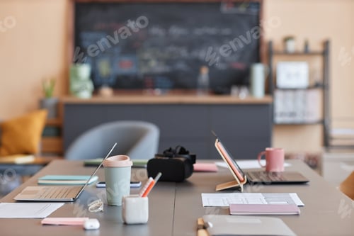 Preview: Background image of office workspace with VR headset on meeting table