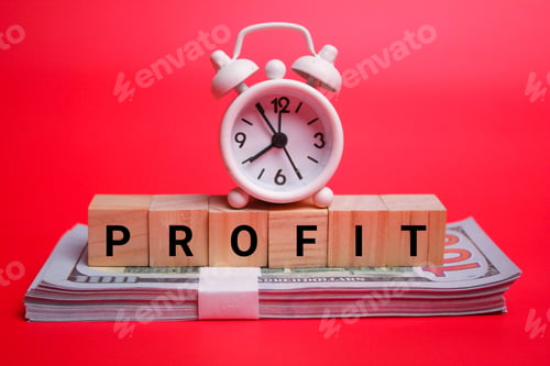 Preview: paper money, bell clock and the word profit. the concept of profit or income