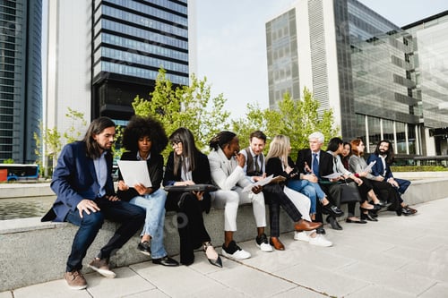 Preview: Multiethnic business people working outdoor from office - Focus on senior man face