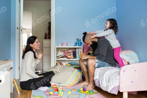 Preview: Mother and step-father playing with their daughter