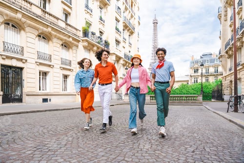 Preview: Group of young happy friends visiting Paris and Eiffel Tower