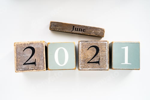 Preview: Numbers wood block cubes isolated on white background. 2021 June New Year abstract design concept