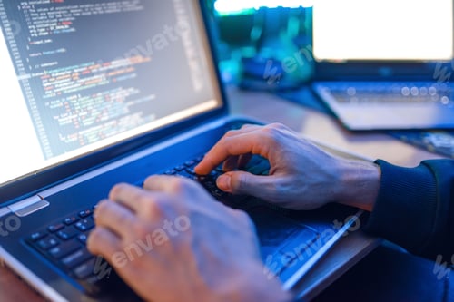 Preview: Hacker sitting at laptop, information hacking