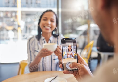 Preview: Love, coffee and a cafe, a happy couple meeting for a breakfast date in the city. A man taking a ph