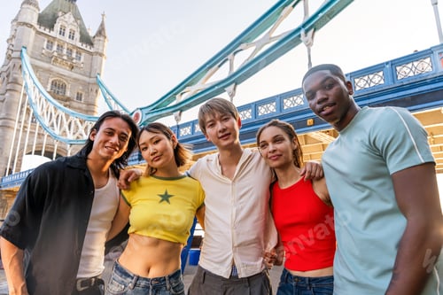 Preview: Multiracial group of happy young friends bonding in London