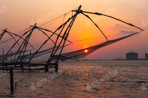 Preview: Chinese fishnets on sunset. Kochi, Kerala, India