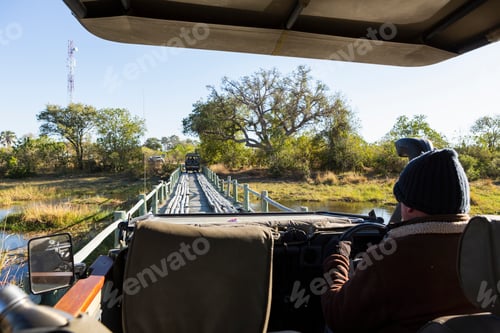 Preview: Safari vehicle crossing Fourth Bridge, Okavango Delta, Botswana.