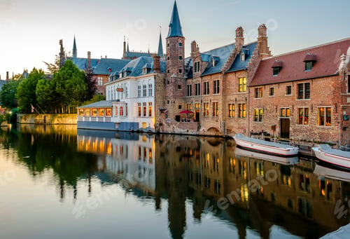 Preview: Bruges (Brugge) cityscape with water canal at sunset