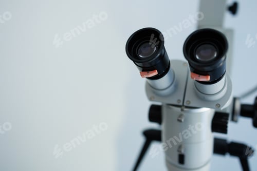 Preview: Close-up of a dental microscope on a white background
